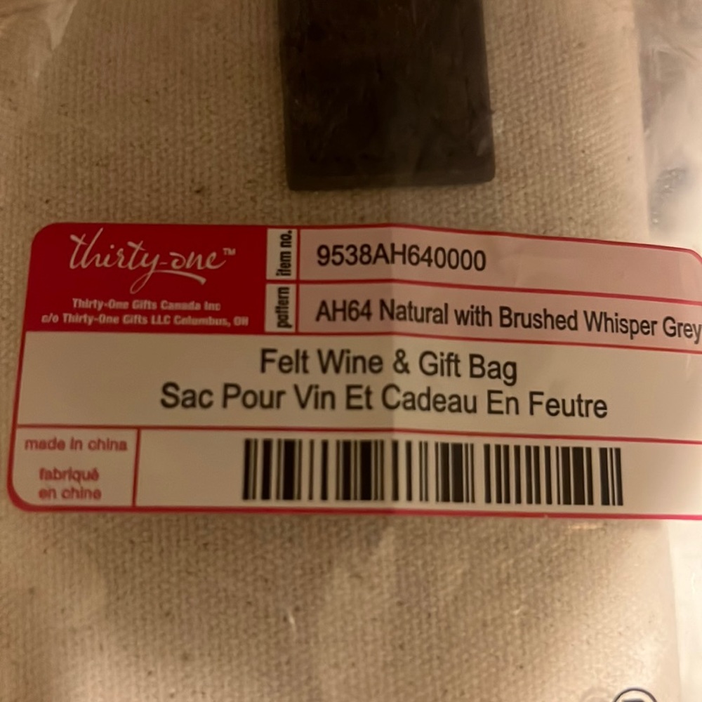 Thirty one Felt wine and gift bag.  Never been opened